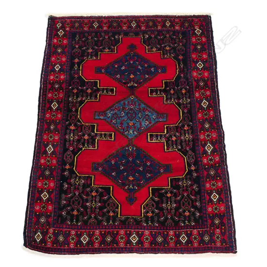 A Persian Hamadan hand-knotted wool pile rug