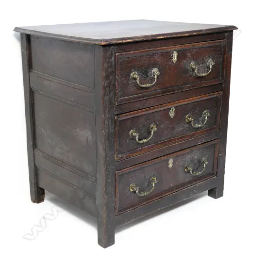 A small proportion Georgian oak three drawer chest,