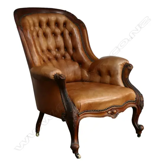 A quality Victorian carved walnut framed leather grandfather arm chair,