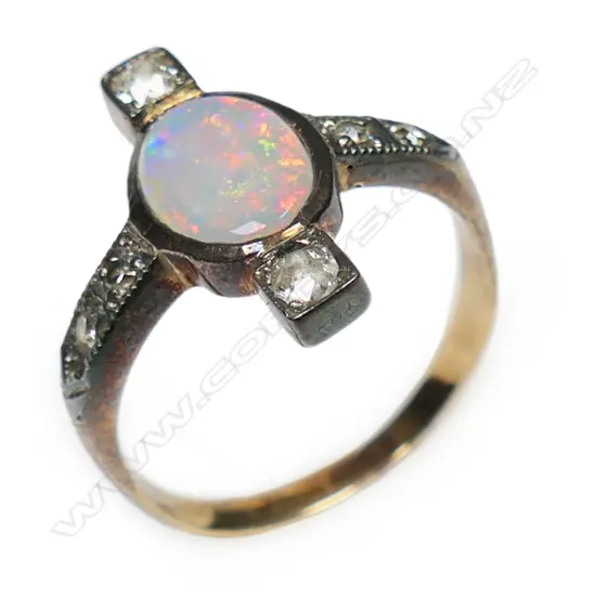An Art Deco 15ct gold, diamond and opal ring,