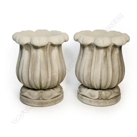 A pair of quality concrete garden planters,