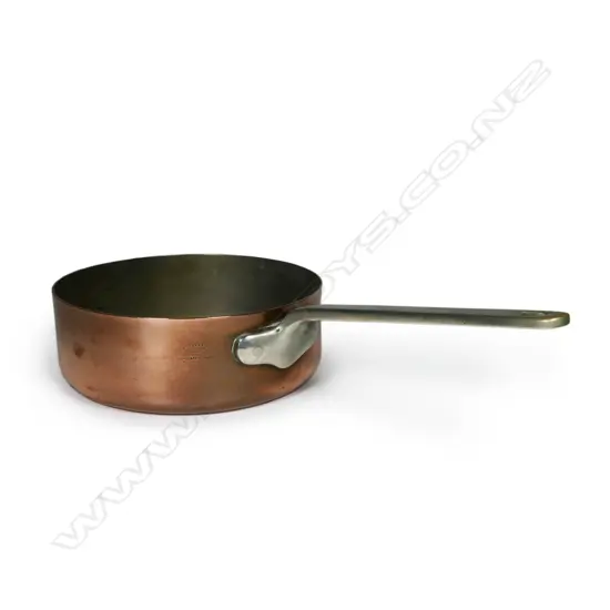 A large quality copper saucepan,