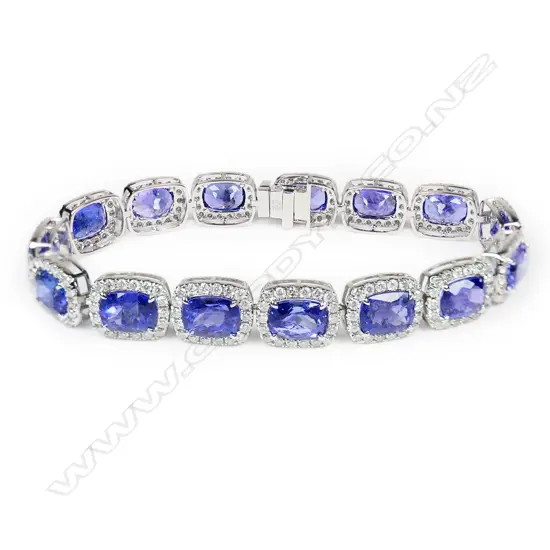 A 14ct white tanzanite and diamond halo bracelet,