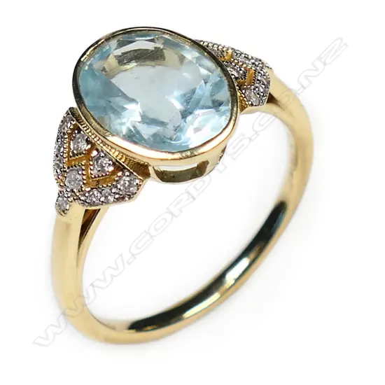 A 14ct gold aquamarine and diamond ring,