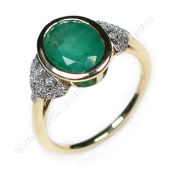 A 14ct gold emerald and diamond vintage style ring,