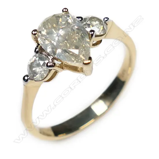 A 14ct gold and fancy yellow diamond trilogy ring,