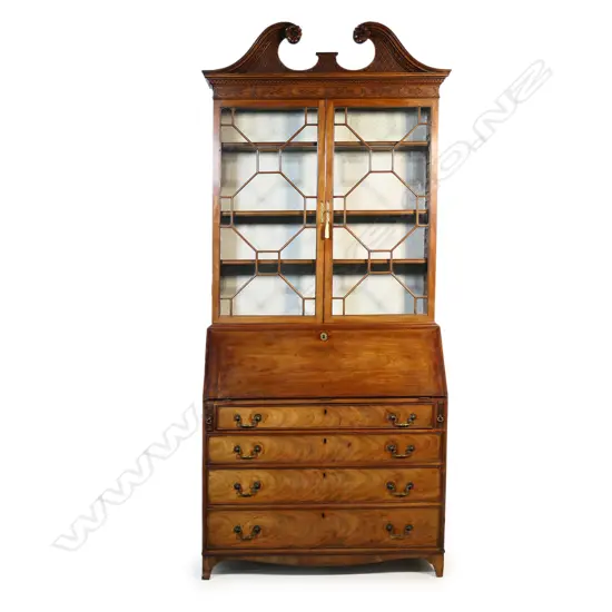A mahogany George III bookcase bureau,