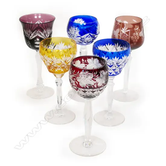 A harlequin set of six Bohemian wine glasses,