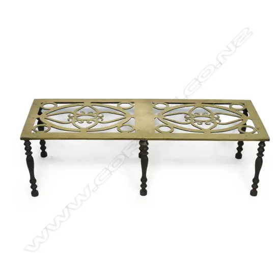 An early Victorian brass and iron large trivot,