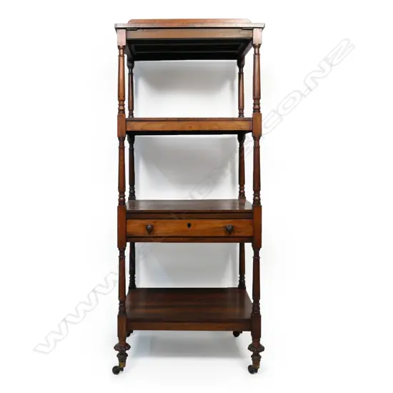 A William IV four tier rosewood whatnot,