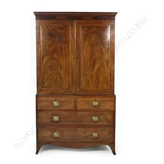 An early Victorian mahogany linen press,
