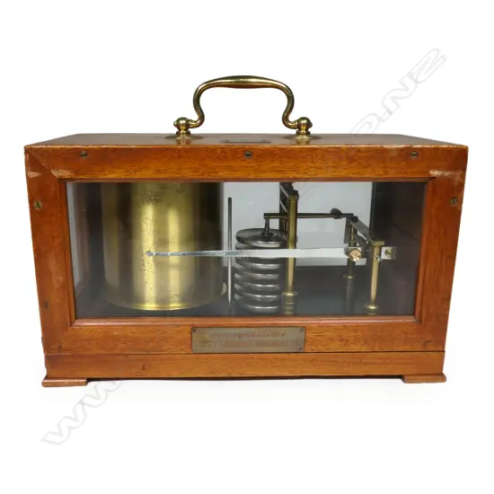 A WW2 German military barograph, in mahogany case with three glazed panels, the cover with small plaque engraved with a swastika above 'M' above '2745', the front with plaque engraved 'Presented by Lieut. Comdr S.C. Bradley RNR'. 285 x 140 x 165mm. Provenance: ex The Jack Thornton estate collection.