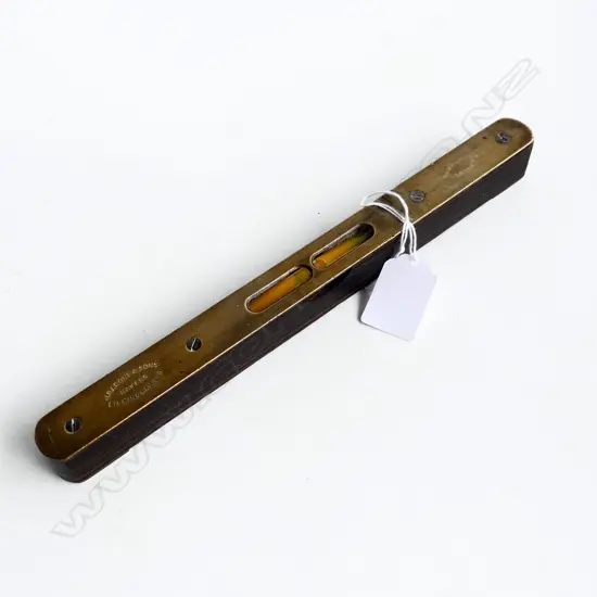 Antique brass & rosewood level by J. Rabone Birmingham in excellent order. L.250mm