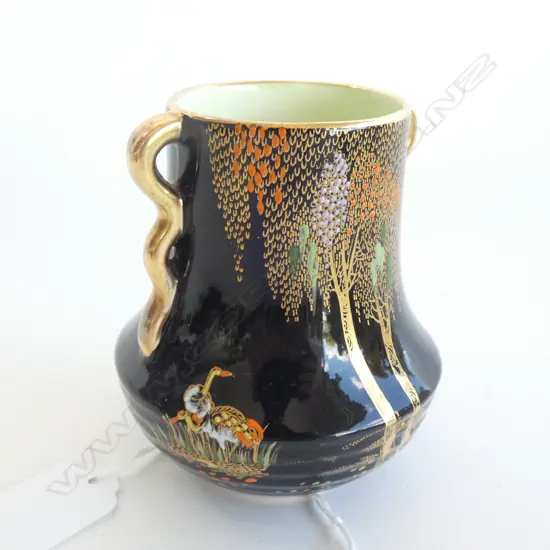 A small Carlton Ware Noir Royale enamelled vase
