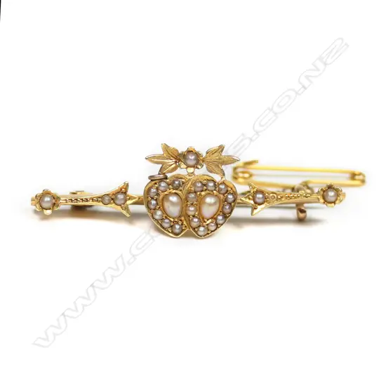 A 15ct gold and seed pearl fancy bar brooch,