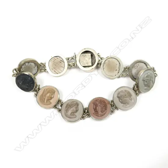 A c.1900 silver and multi coloured lava cameo bracelet