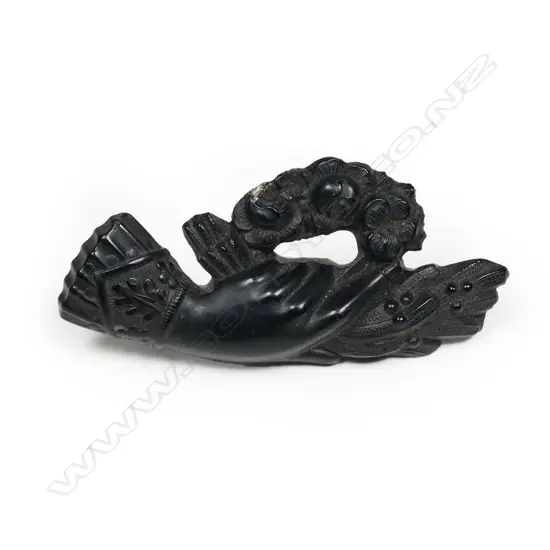 A Victorian vulcanite mourning brooch,