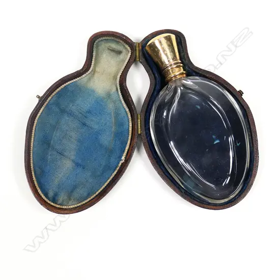 A late 19thC, Dutch 14ct gold topped and cased glass perfume bottle,