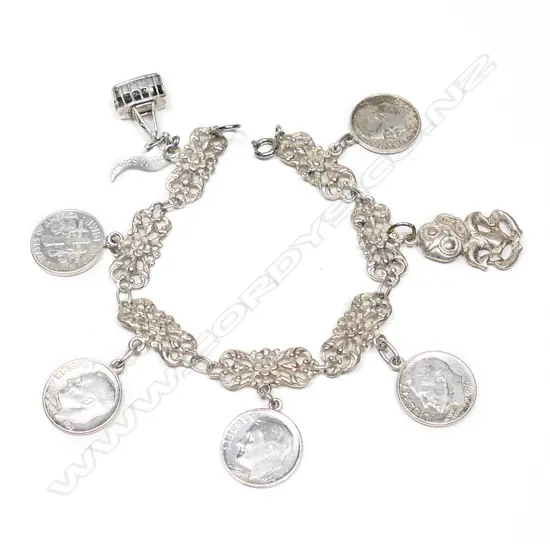 An .800 silver American multi one dime charm bracelet,
