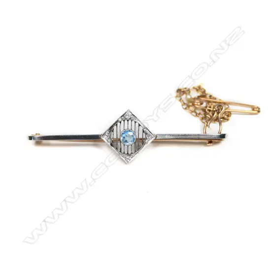 An Art Deco 15ct gold diamond and blue stone bar brooch,