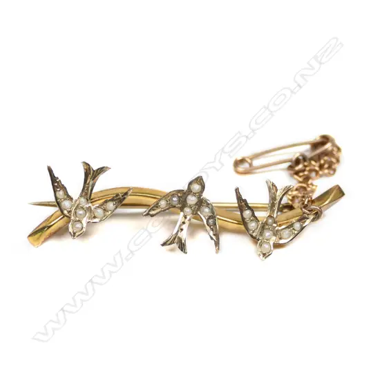A Victorian 9ct gold seed pearl three swallow bar brooch,