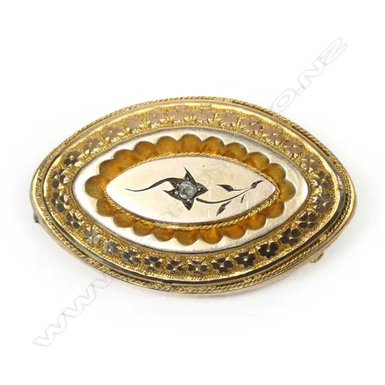A Victorian gilded 18ct gold oval brooch,
