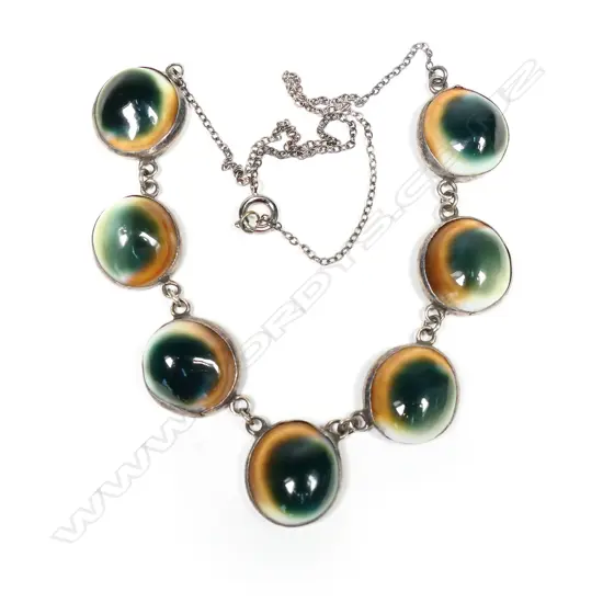 A vintage handmade silver cat's eye necklace,