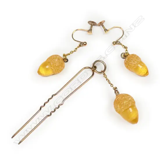 A pair of Victorian 9ct gold and kauri gum earrings and hair clip set,