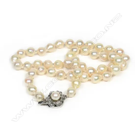 A string of uniform cultured pearls,