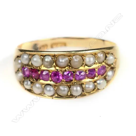 An antique 15ct yellow gold ruby and seed pearl ring,