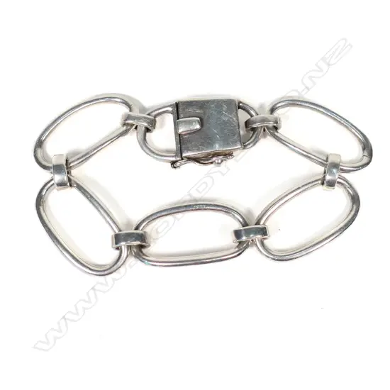 A heavy sterling silver bracelet,