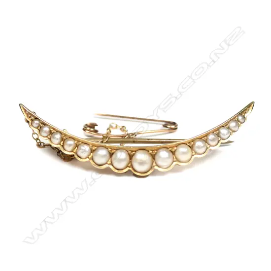 A15ct gold seed pearl crescent brooch,