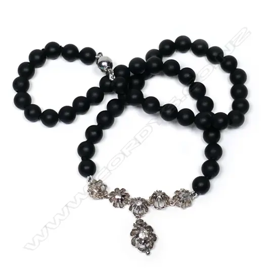 Onyx beads necklace with diamond set clasp,