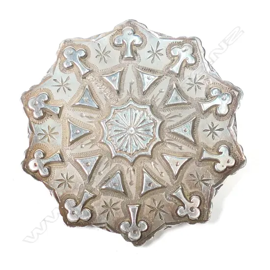 A late Victorian silver round brooch