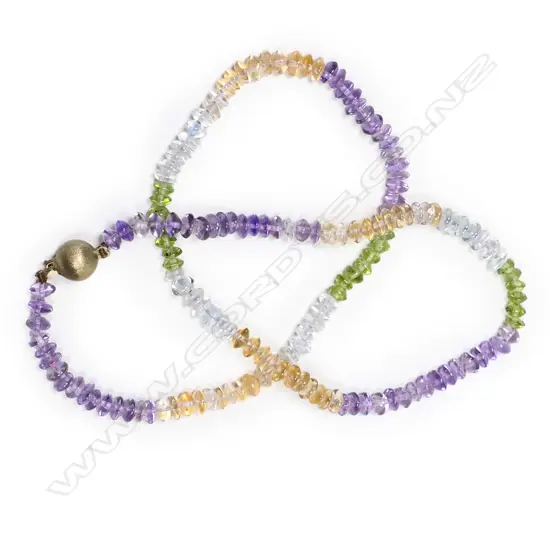 A 9ct ball clasp amethyst and peridot bead necklace,