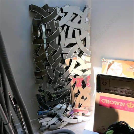 A pair multi-arch panelled contemporary mirrors