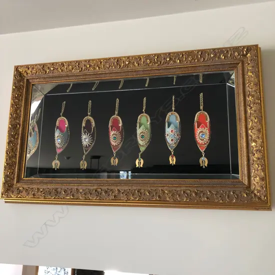 6 FANCY INDIAN SHOES FRAMED UNDER GLASS