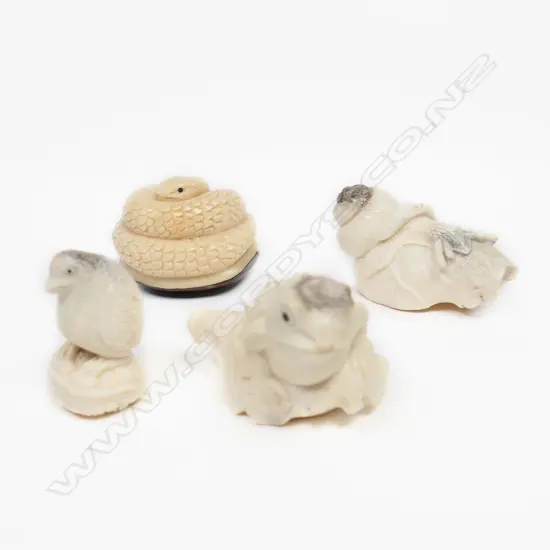 Four small carvings,