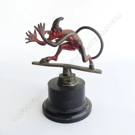 Early 20thC car mascot as a devil repaired tail,