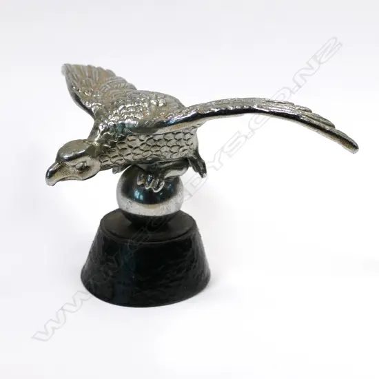 Chromed early 20thC eagle with lowered tail (allow for bonnet) car mascot,