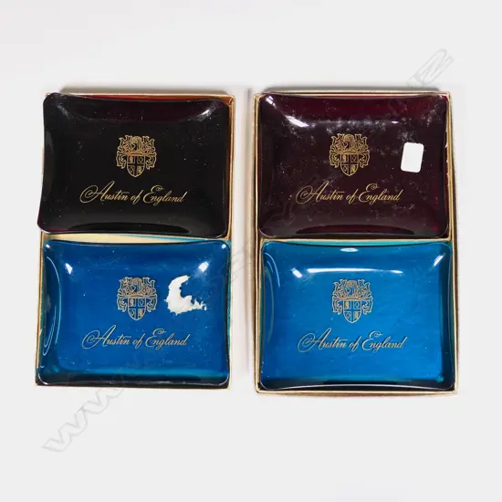 Two boxed pairs of Austin Healey glass ashtrays,