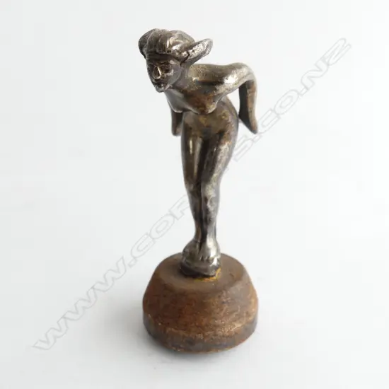 Small chrome poised lady motorcycle (or light car) mascot,