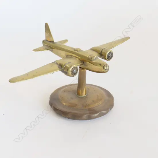Brass plane mascot,