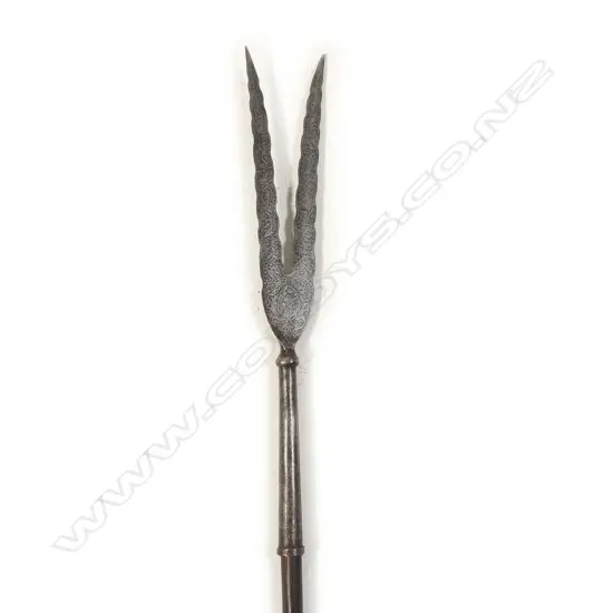 A 19thC Persian bident spear, with serrated forked blade,