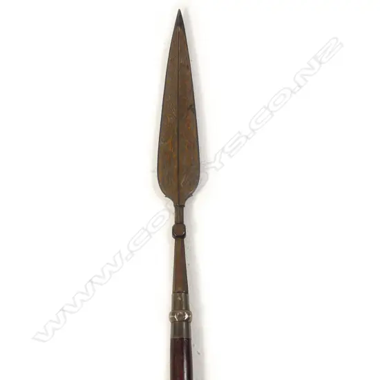 An Indo-Persian spear with engraved blade, socket fitted to a rosewood shaft,