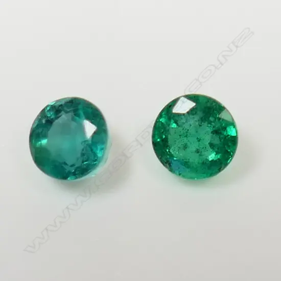 2 EMERALDS, 0.65ct. RATING 4-5