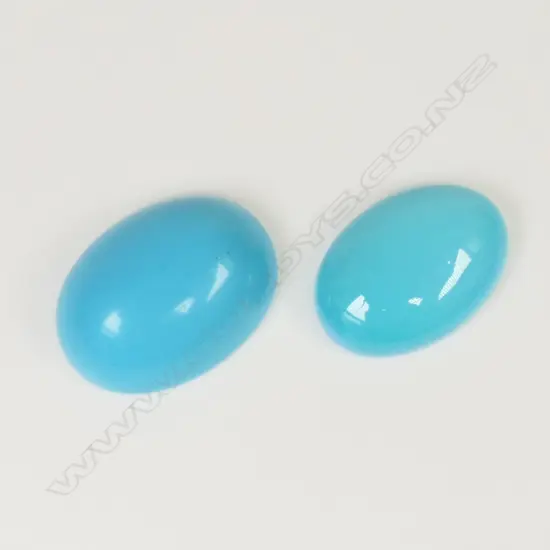 2 NATURAL TURQUOISES 12.18ct. 14/10
