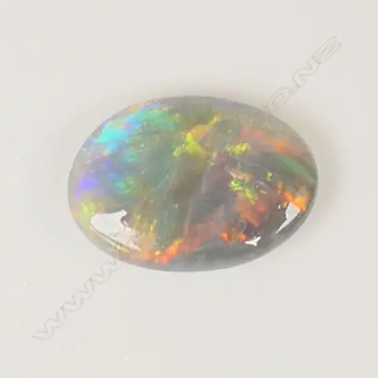 1 BLACK OPAL (RED/ORANGE), 0.41ct. RATING 5-6