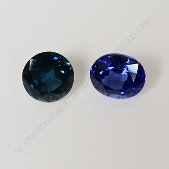 2 SAPPHIRES, 0.92ct. RATING 6