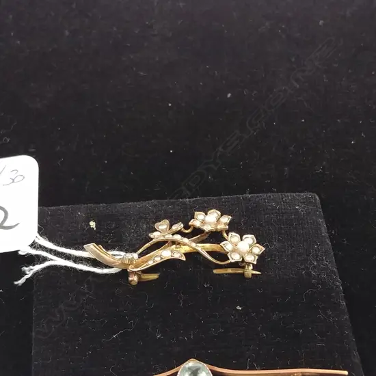 EDW SEED PEARL FLORAL BROOCH. VAL. $895